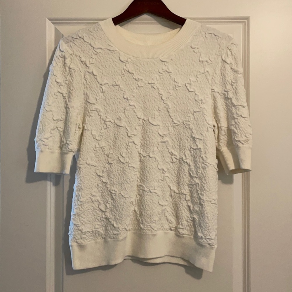 Free people short sleeve sweater. Large.